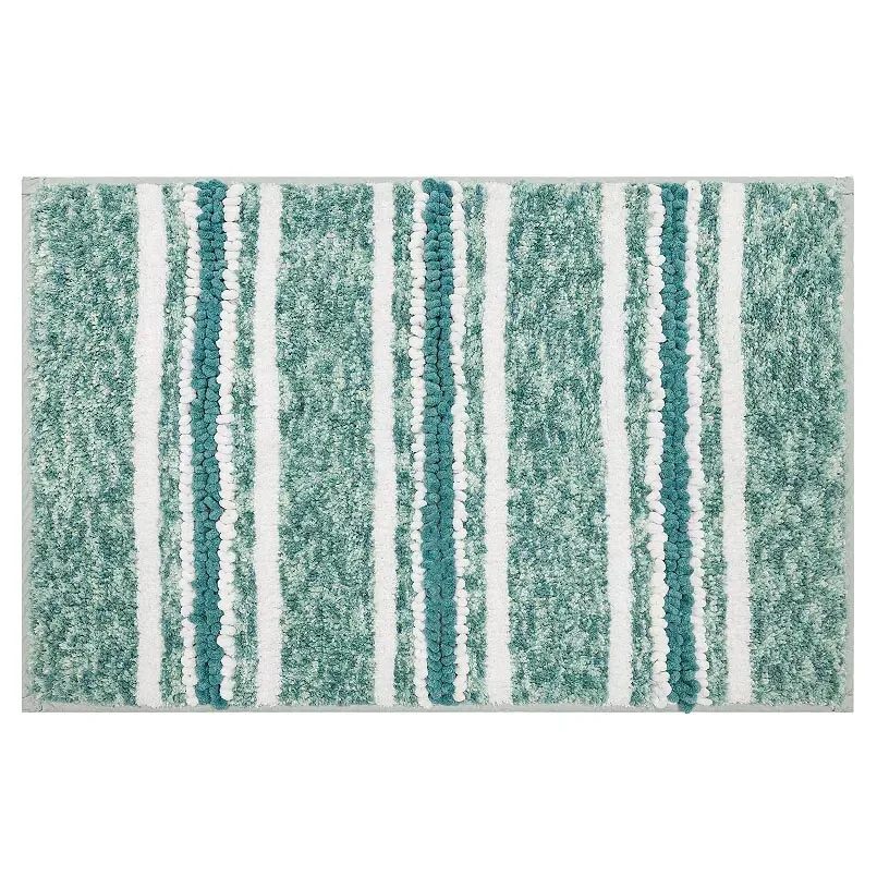 A bath mat with a textured pattern featuring vertical stripes in shades of green, teal, and white.