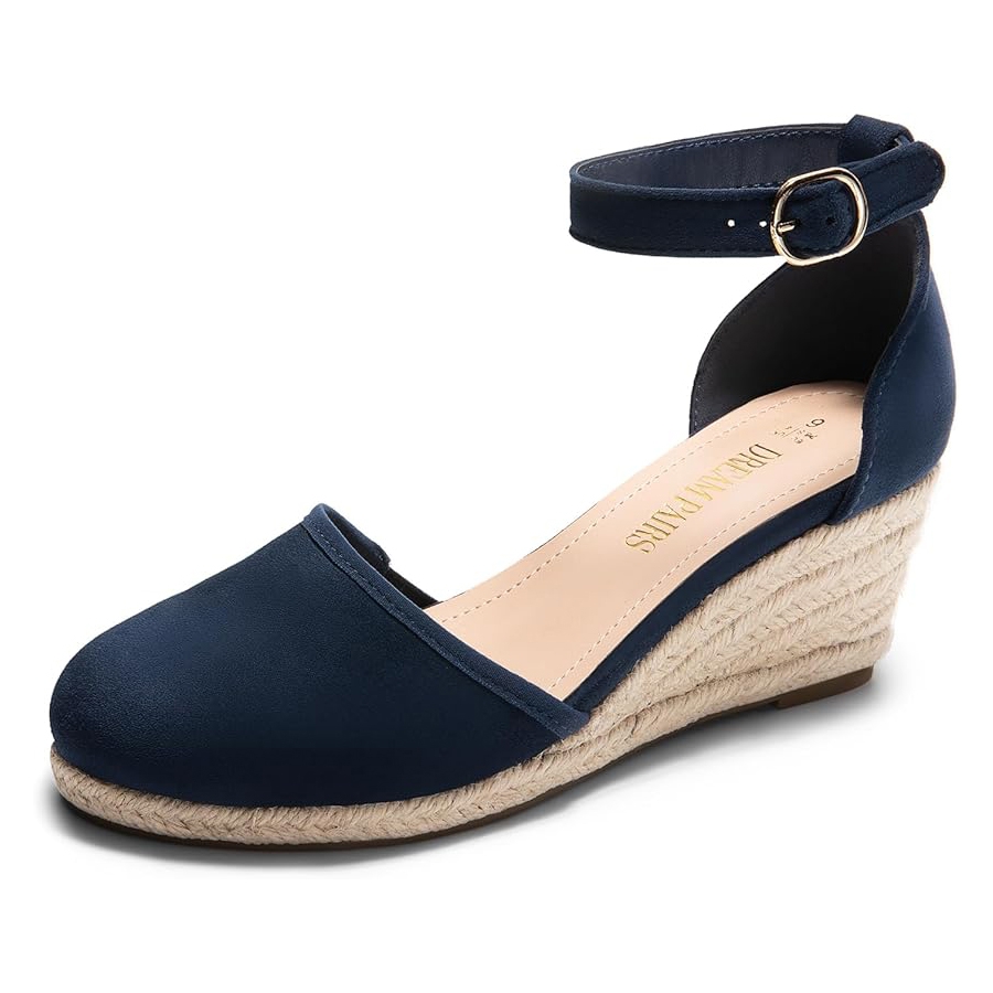 Navy blue wedge sandal with an ankle strap and buckle, featuring a rope-textured wedge heel.