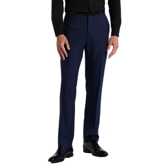 A man is wearing navy blue dress pants with a subtle check pattern, paired with a black dress shirt and black dress shoes.
