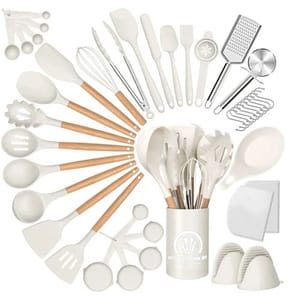 A 44-piece white kitchen utensil set with wooden handles includes spatulas, spoons, tongs, whisks, measuring spoons, grater, peeler, and more, all housed in a matching canister.