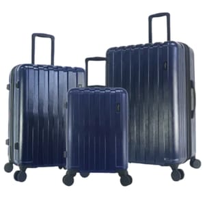 Three navy blue hard-shell suitcases of varying sizes with four wheels each and telescopic handles.