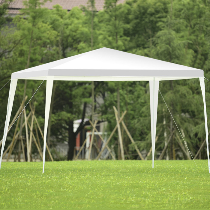 A white outdoor canopy tent with four legs and a peaked roof set on a grassy area, supported by ropes for stability.