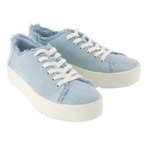 Light blue denim sneakers with frayed edges, white laces, and a thick white sole.