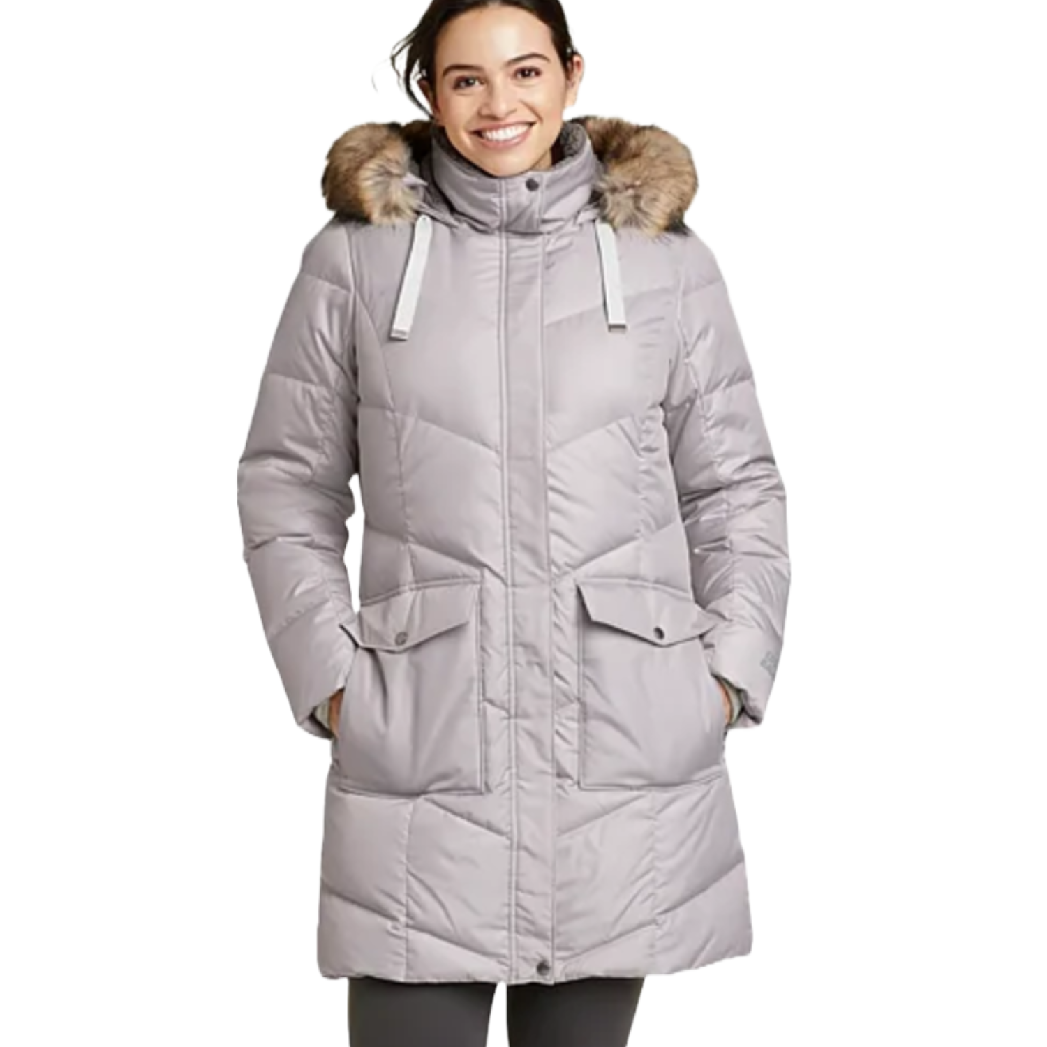 Eddie Bauer Lodge Cascadian Parka is a knee-length, light gray winter coat with a fur-trimmed hood, front flap pockets, and a quilted design for insulation.