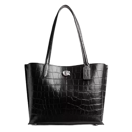 The Coach Willow Tote in black features a crocodile-embossed pattern with two shoulder straps and a central turn-lock closure, offering a stylish and functional handbag option.