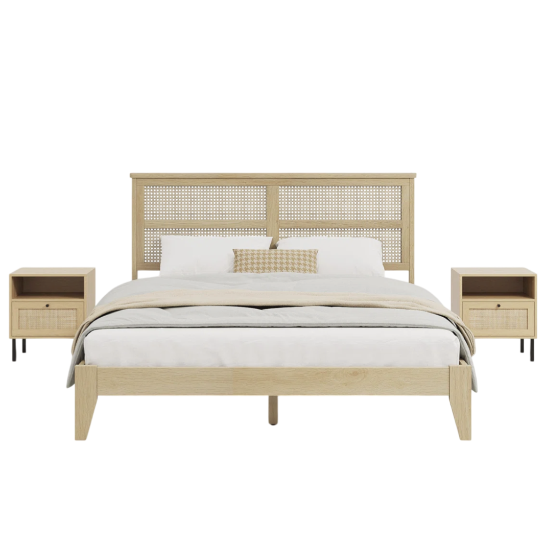 A natural wood bed frame with a woven rattan headboard is flanked by two matching nightstands featuring open shelves and drawers with rattan fronts.