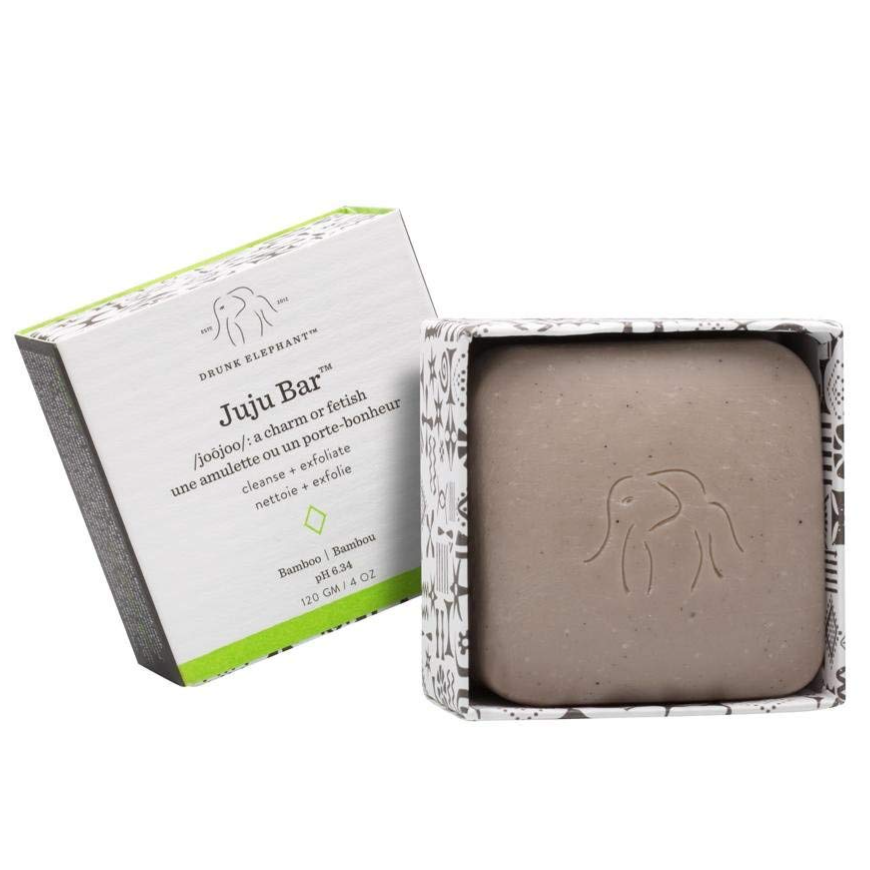 Drunk Elephant's Juju Bar, 120g, is a cleansing and exfoliating bar with a pH of 6.34, featuring bamboo and presented with elephant motif packaging.