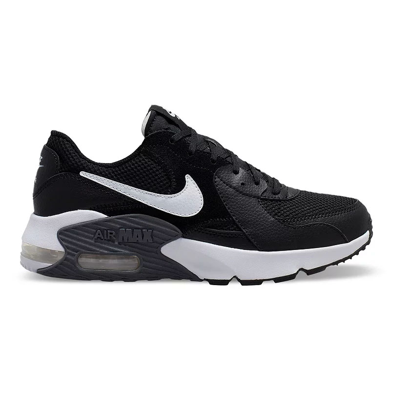 Black and white Nike Air Max sneakers featuring a visible Air unit in the sole, with a mesh and leather upper.