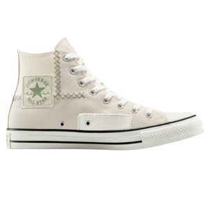 A high-top Converse All Star sneaker featuring a patch-like design with visible stitching, in a light beige color with a green logo patch.