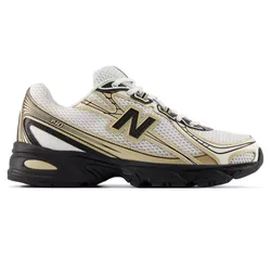 Athletic shoe featuring black and gold accents on a white mesh body with a black sole, highlighting a New Balance logo on the side.
