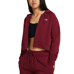Maroon cropped hoodie with a front zipper, drawstring hood, long sleeves, and Under Armour logo on the chest. Paired with matching sweatpants.