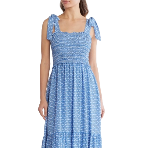 A blue maxi dress featuring tie straps and a smocked bodice with a delicate pattern throughout, offering a relaxed and feminine silhouette.