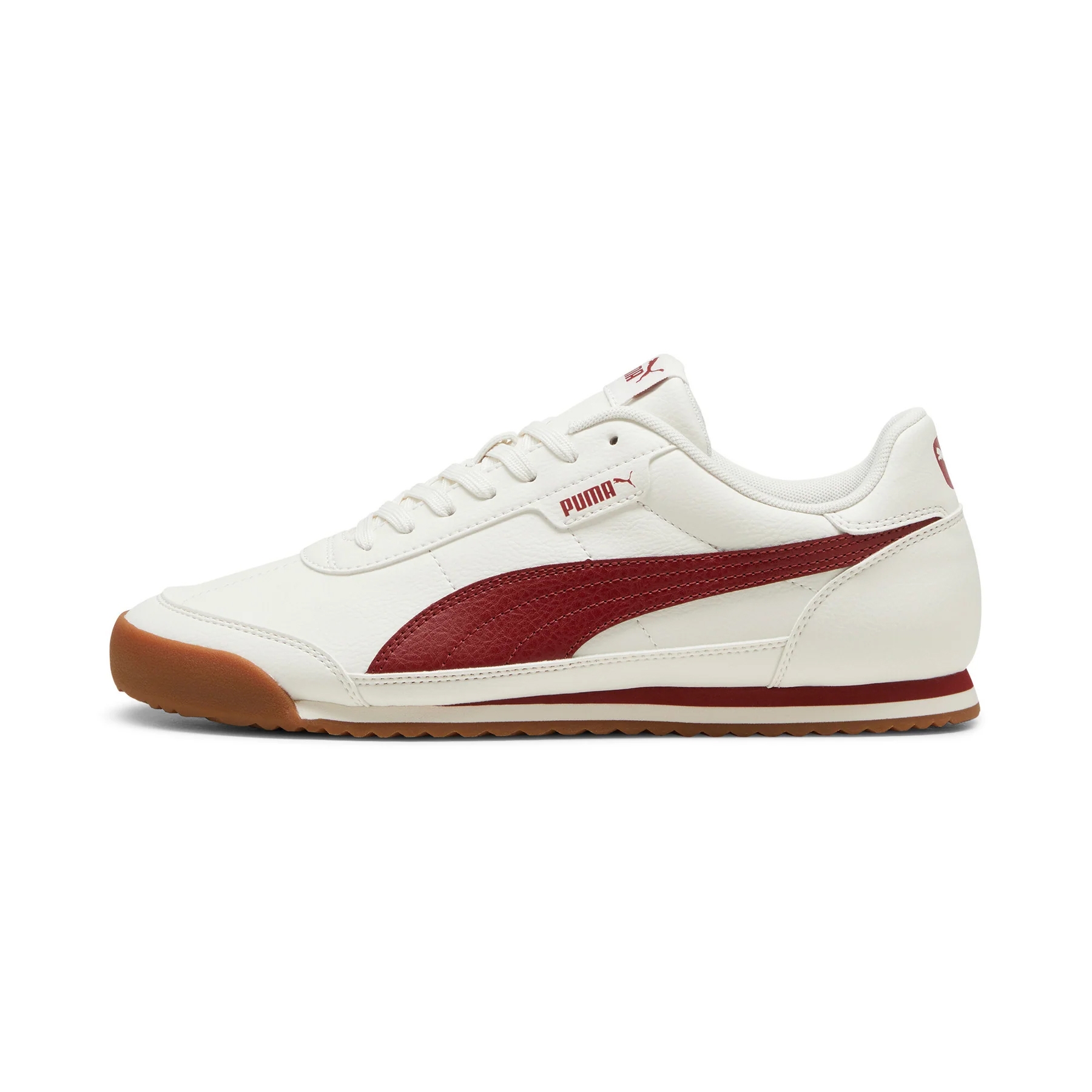 White Puma sneaker with a burgundy side stripe and brown gum sole.