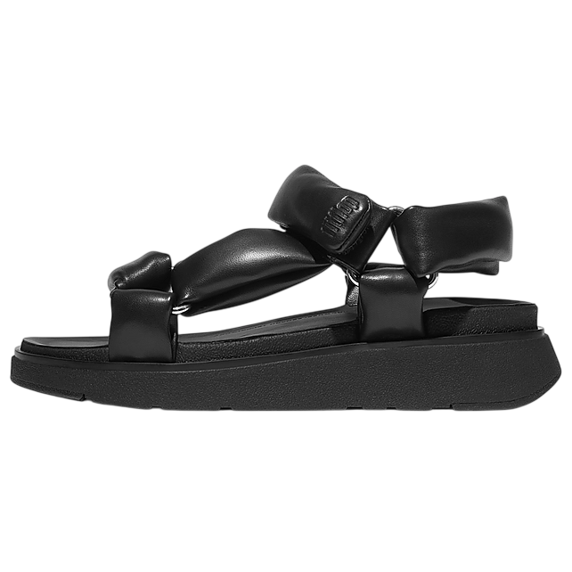 A black puff strap sandal with an elevated platform sole and cushioned upper straps. The design features adjustable closures for comfort.