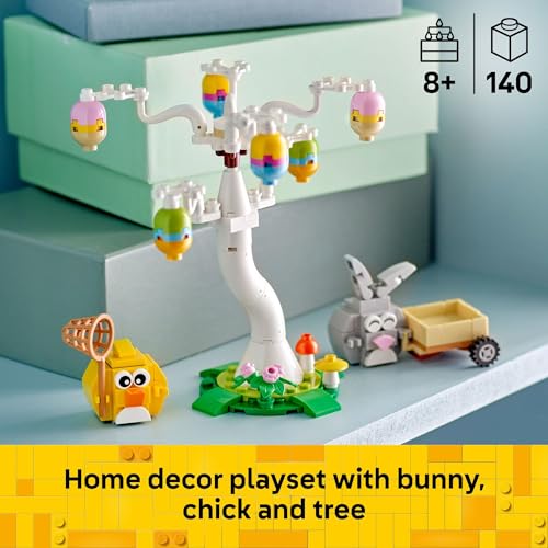 Toy set featuring a white tree with colorful hanging ornaments, an orange chick, a gray bunny with a cart, suitable for ages 8 and up, consisting of 140 pieces.