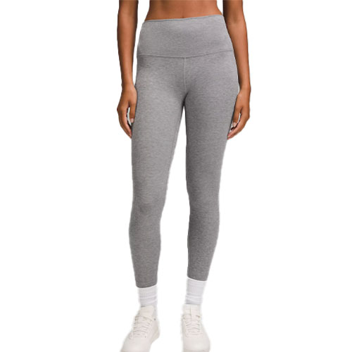 High-waisted gray leggings paired with white socks and white sneakers.