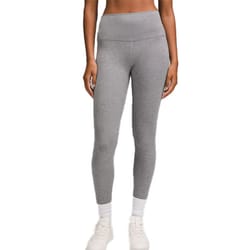 High-waisted gray leggings paired with white socks and white sneakers.
