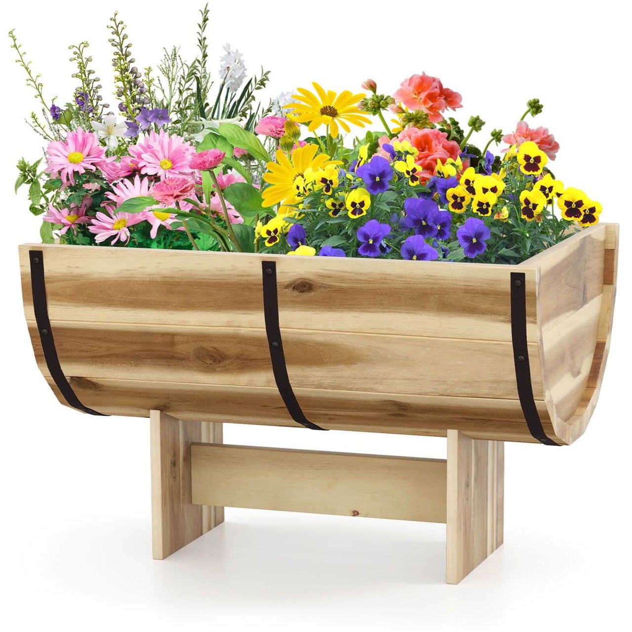 Wooden raised garden bed with metal accents, containing various colorful flowers, including pink daisies, yellow blooms, and purple violas.