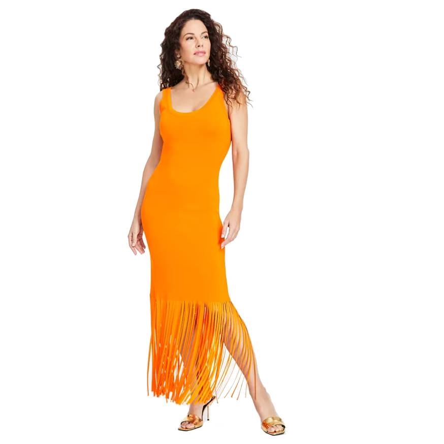 A vibrant orange, sleeveless sweater dress with a scoop neckline and a fringe hem, paired with gold high-heeled sandals.