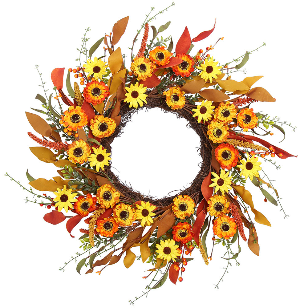 A 20-inch wreath featuring faux daisies, orange flowers, and red leaves set against a twig base, creating a vibrant autumnal display.