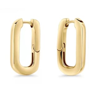 Gold rectangular hoop earrings with a sleek, modern design featuring a hinged closure.