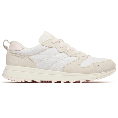A stylish sneaker with a beige and white color scheme, featuring a textured floral pattern on the sides and suede accents.
