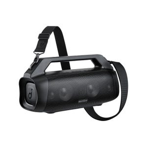 A portable Soundcore Bluetooth speaker with a sturdy design, featuring a built-in handle and adjustable strap for easy carrying. The speaker is equipped with multiple controls on top and a mesh grille for sound output.