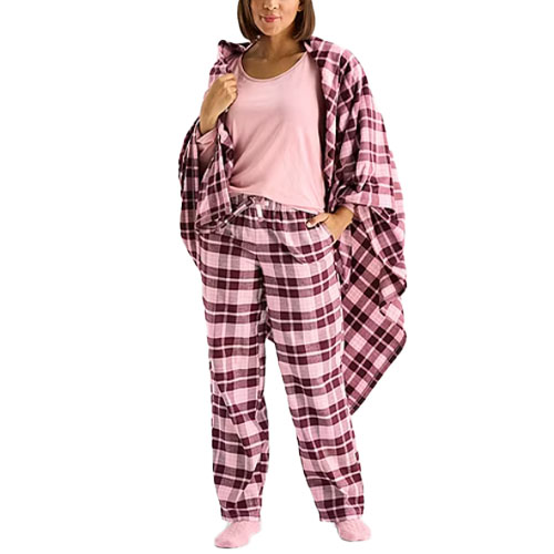 A person is wearing pink plaid pajamas with a matching plaid blanket wrapped around their shoulders and a plain pink shirt underneath.