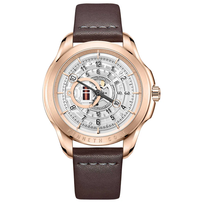 A men's rose gold-tone watch with a brown leather strap, featuring a silver dial with visible gears and a unique time display.