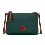 A green crossbody bag with brown leather accents and stitching, featuring a small oval patch with an embossed design, and a zippered top closure.