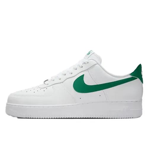 White sneaker with green accents, including a green swoosh logo on the side and green detailing on the heel.