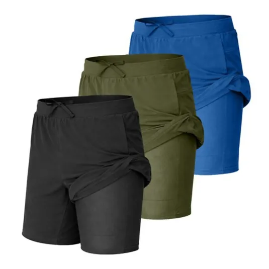 Three pairs of athletic shorts in black, green, and blue with built-in leggings and drawstring waists.