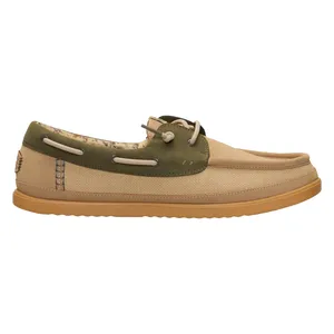 Tan and olive green boat shoe with a gum sole, featuring lace-up detailing and decorative stitching.