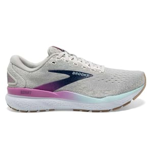A Brooks Ghost running shoe with a light gray mesh upper, white laces, and a gradient midsole in pink and blue.