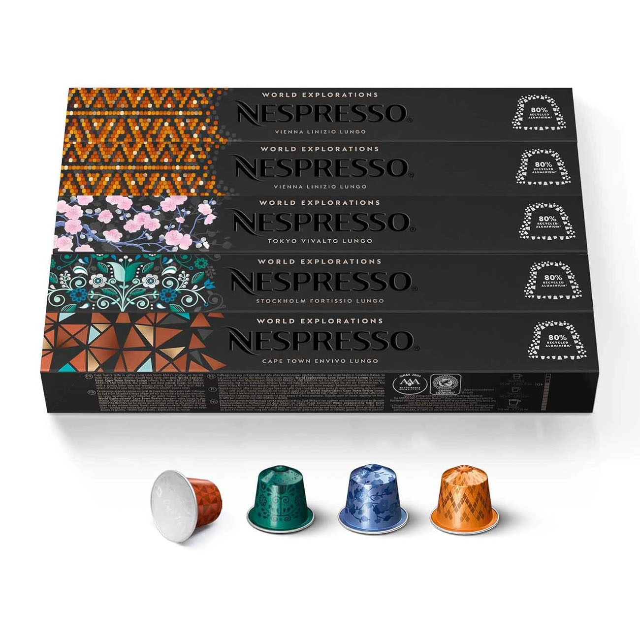 Nespresso World Explorations coffee capsules are shown, featuring Vienna Linizio Lungo, Tokyo Vivalto Lungo, Stockholm Fortissio Lungo, and Cape Town Envivo Lungo, each with distinct colorful packaging.