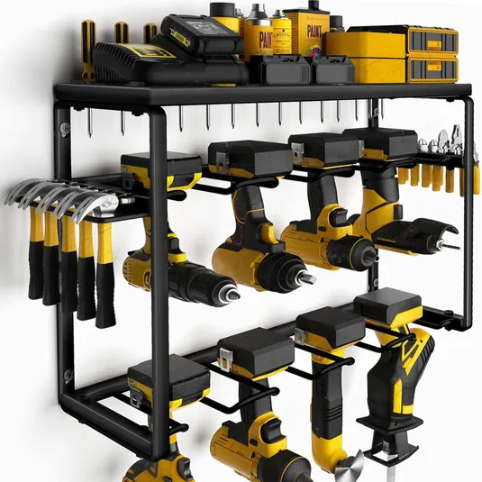 A wall-mounted tool organizer holds power drills, hammers, screwdrivers, battery chargers, and paint containers, with a black and yellow color scheme.