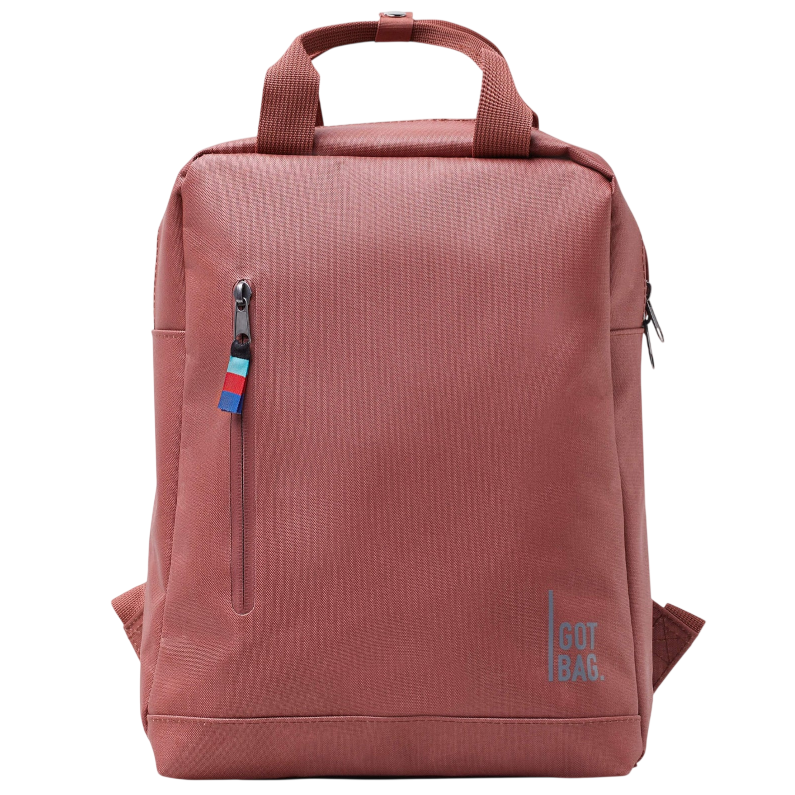 A rust-colored backpack with a top handle, a front zip pocket featuring a multicolored pull tab, and a printed \“GOT BAG\“ logo.
