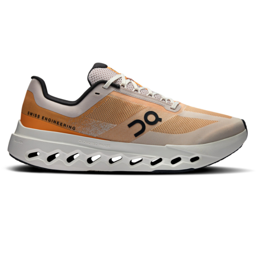 On Cloudstratus running shoe in a beige colorway, featuring Swiss engineering, with a distinctive CloudTec sole design for enhanced cushioning.