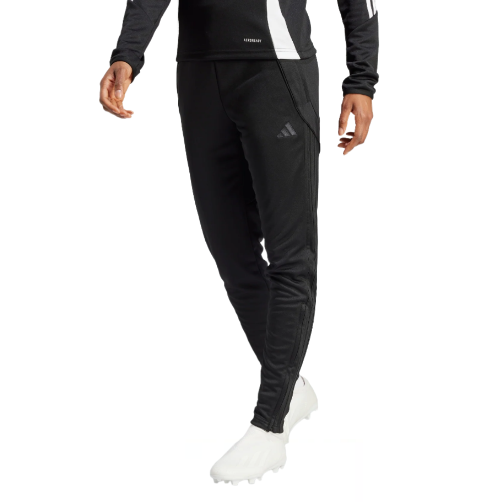 Black athletic joggers featuring the Adidas logo on the right thigh, worn with a matching black long-sleeve top and white athletic shoes.