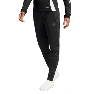 Black athletic joggers featuring the Adidas logo on the right thigh, worn with a matching black long-sleeve top and white athletic shoes.