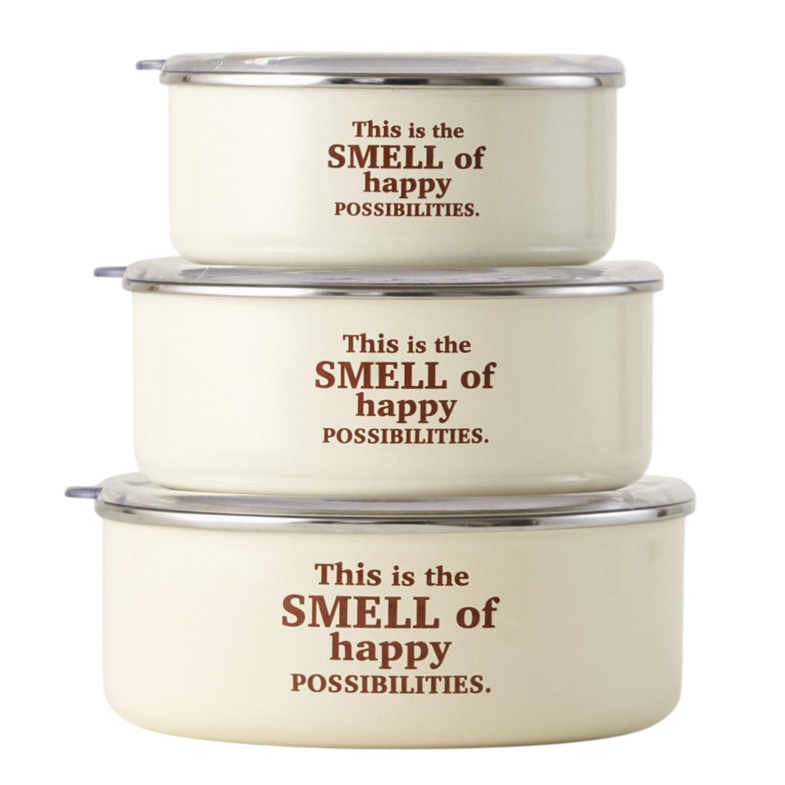 Three stacked, round cream-colored containers with clear lids, featuring the phrase \“This is the SMELL of happy POSSIBILITIES.\“
