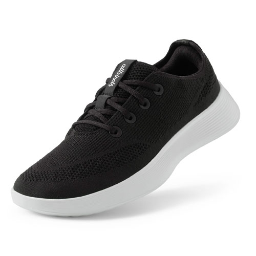 Black and white lightweight running shoes with breathable knit upper and cushioned white sole.