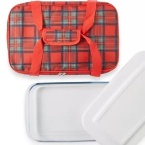Red plaid insulated casserole carrier with two handles, accompanied by a glass baking dish with a white lid.