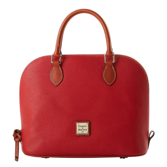 A red leather satchel with top handles, featuring a pebbled texture and a small logo plaque on the front.