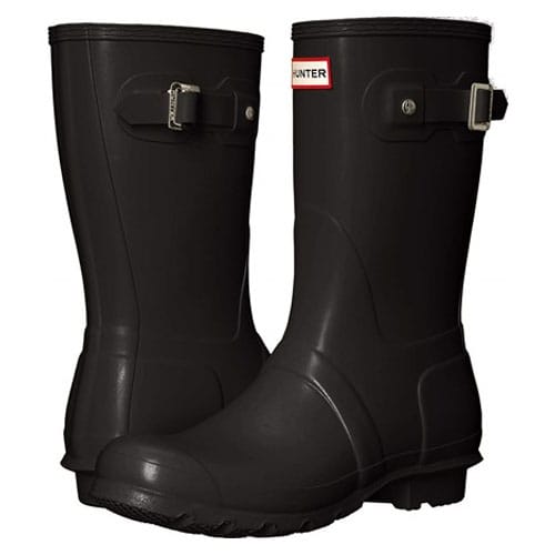 Black rubber rain boots with adjustable buckle straps and textured soles.