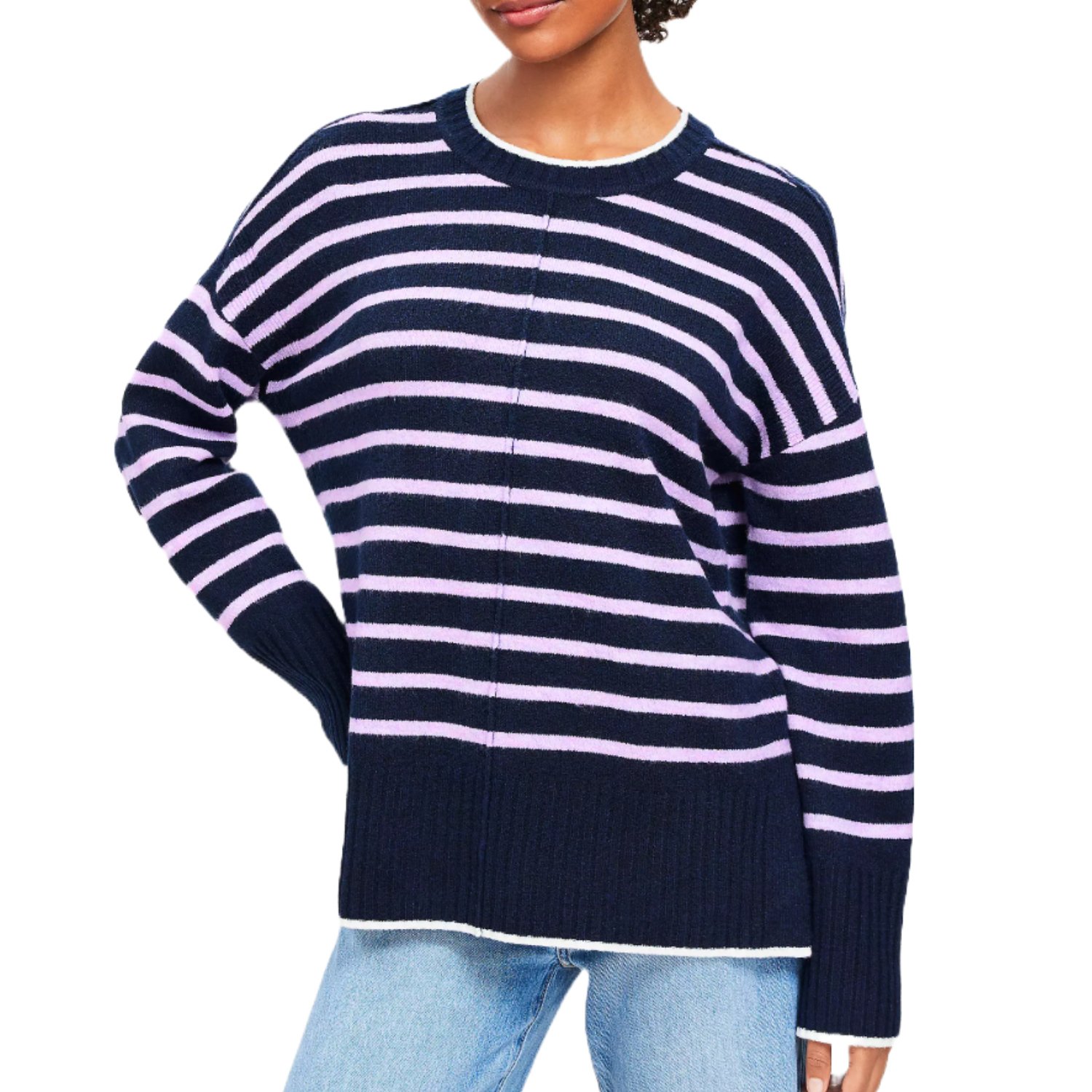 A navy and lavender striped sweater with long sleeves, crew neckline, and ribbed cuffs, paired with light blue jeans.