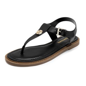 Black faux-leather thong sandal with a gold emblem accent on the strap, adjustable buckle closure, and a brown sole. Comfortable and stylish design for casual wear.