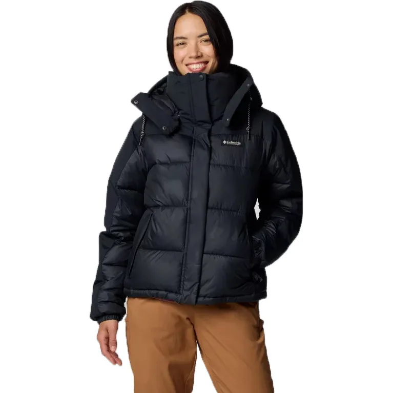 Columbia Snowqualmie Jacket features a black quilted design with a high collar and attached hood, providing warmth and protection. It has a front zipper closure and side pockets, ideal for cold weather.