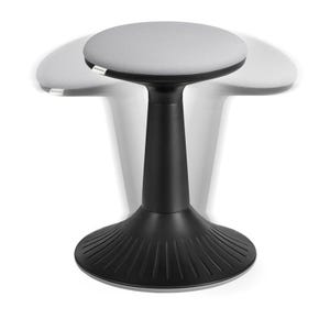 A black wobble stool with a gray cushioned seat, designed to tilt for active sitting and ergonomic support.