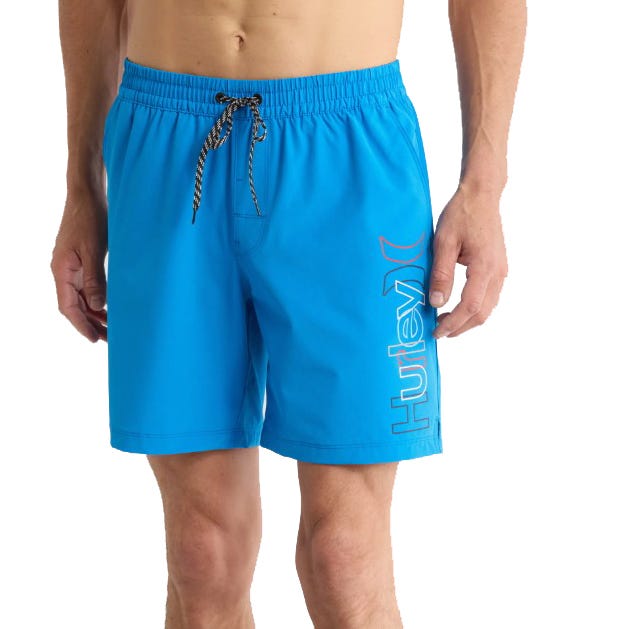 Blue Hurley swim shorts with an elastic waistband and drawstring, featuring a vertical logo design on the left leg.